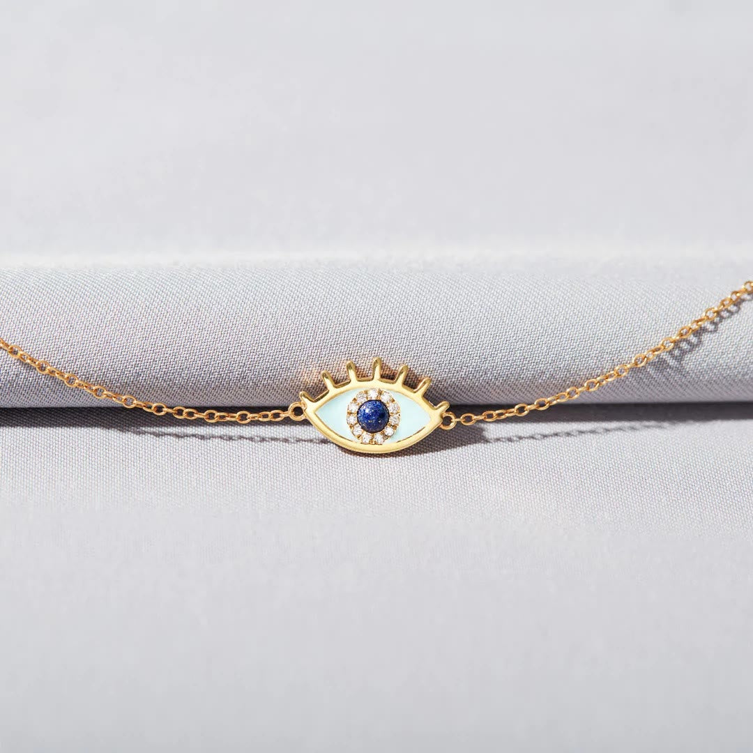 Bracelet fin en or et zircone contre le mauvais œil Olivenorma « SAFE &amp; PROTECTED »