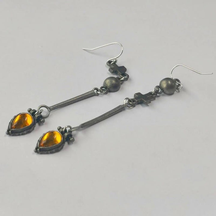Boucles d'oreilles en pierre d'ambre en forme de goutte d'eau de la tribu Olivenorma 