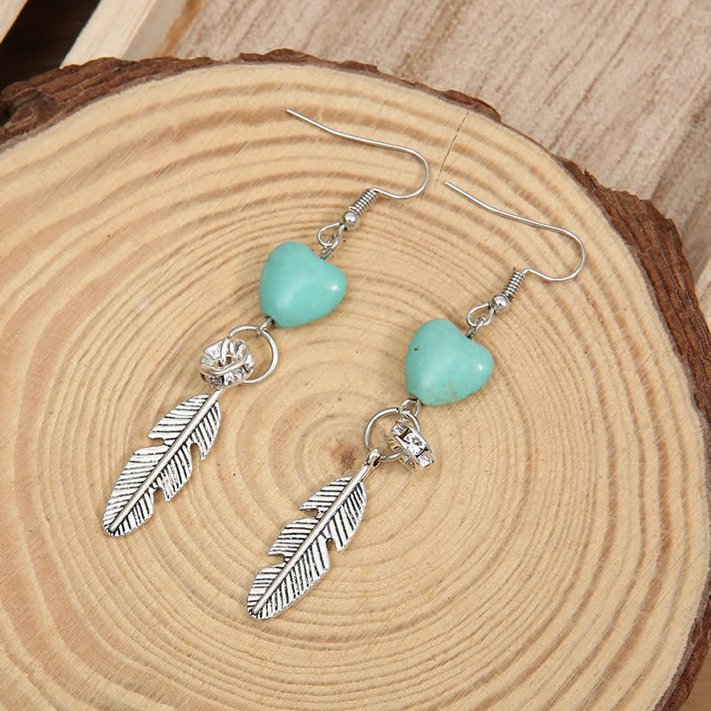 Boucles d'oreilles vintage en forme de cœur et de plumes turquoise