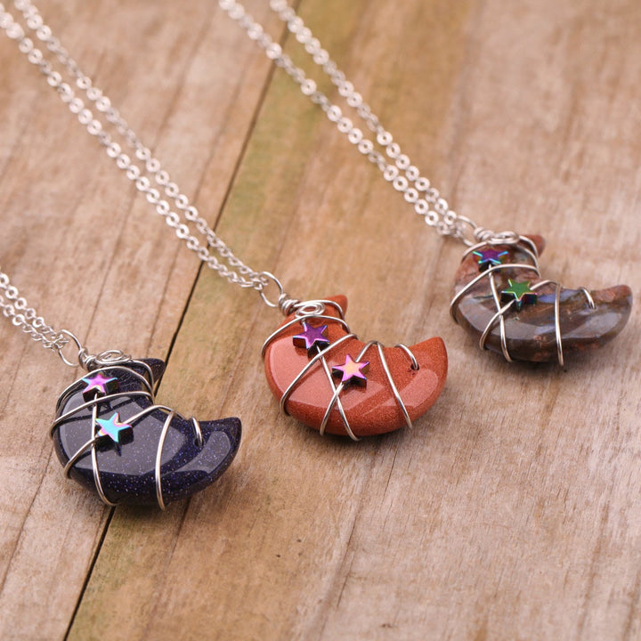 Collier étoile enveloppé de fil de lune en cristal de quartz Olivenorma