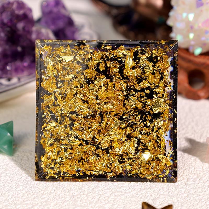 Pyramide d'orgone Oeil d'Horus en obsidienne améthyste Olivenorma