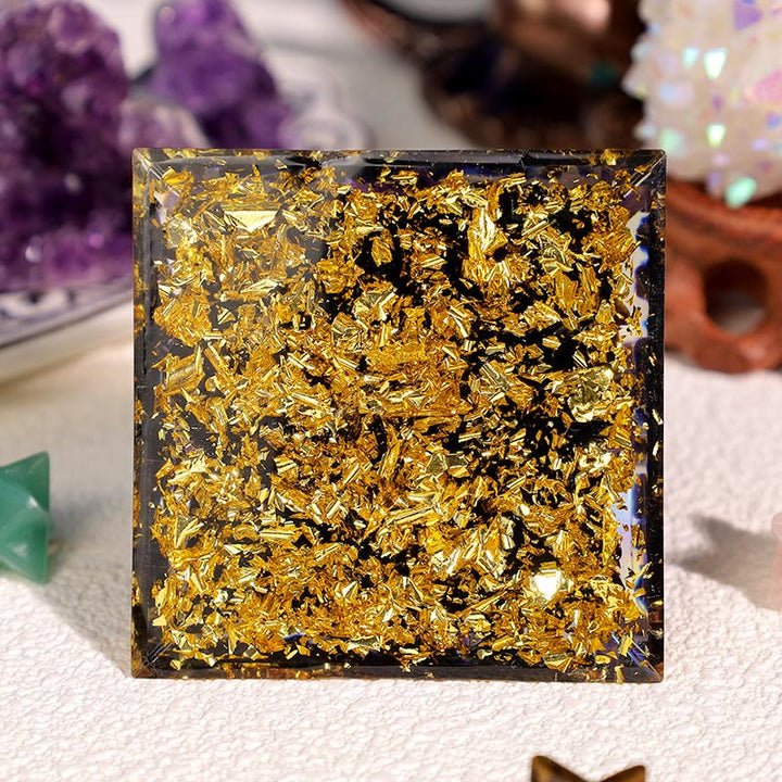 Pyramide d'orgone Oeil d'Horus en obsidienne améthyste Olivenorma