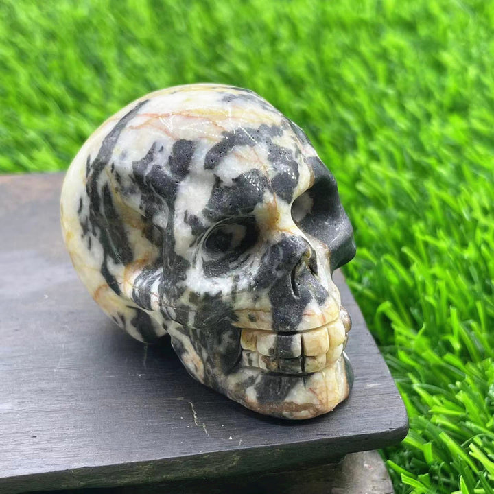 Décoration en pierre précieuse de crâne en cristal naturel sculpté Olivenorma de 5 cm 