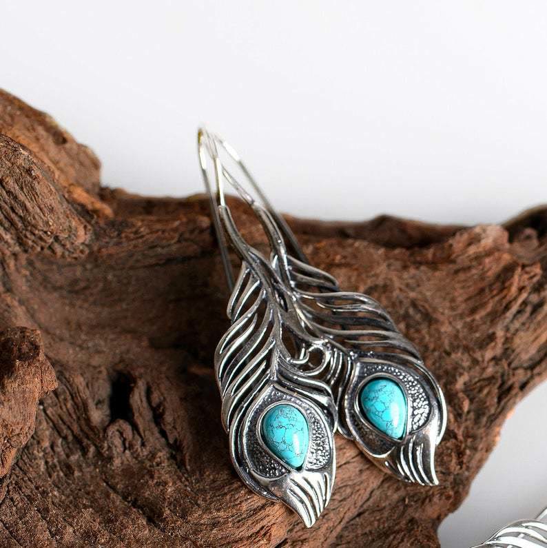Boucles d'oreilles bohèmes découpées en plumes de paon turquoise vintage Olivenorma