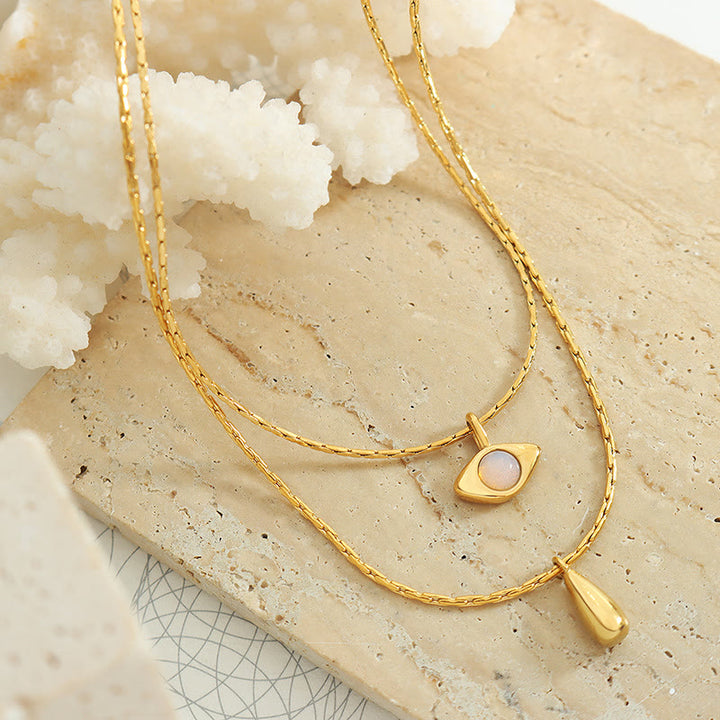 Collier double couche avec pendentif en opalite contre le mauvais œilnorma Olivenorma 