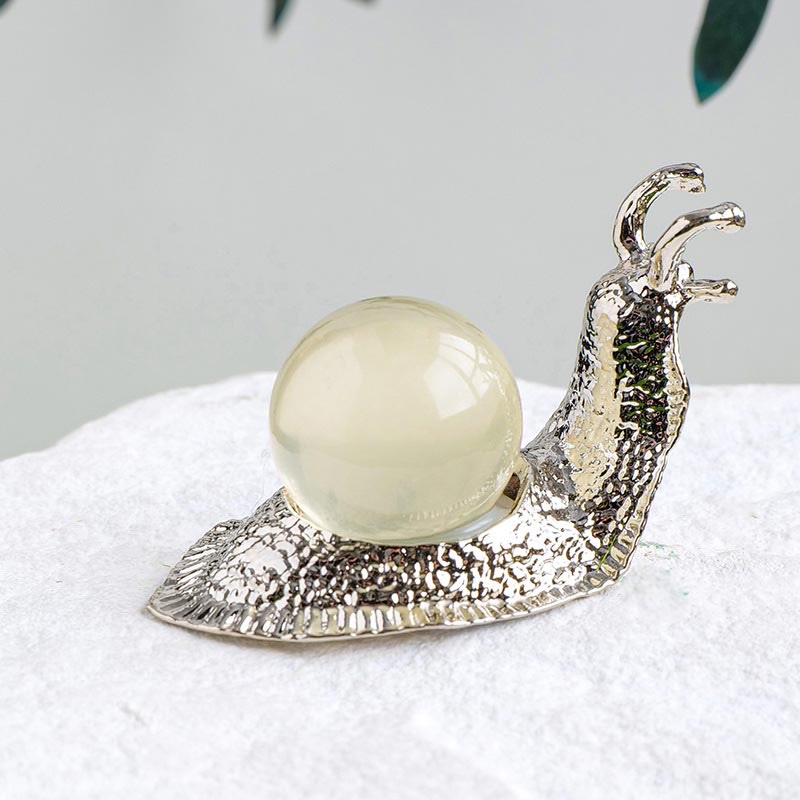Support de boule de cristal naturel Olivenorma, petite décoration en pierre précieuse en forme d'escargot