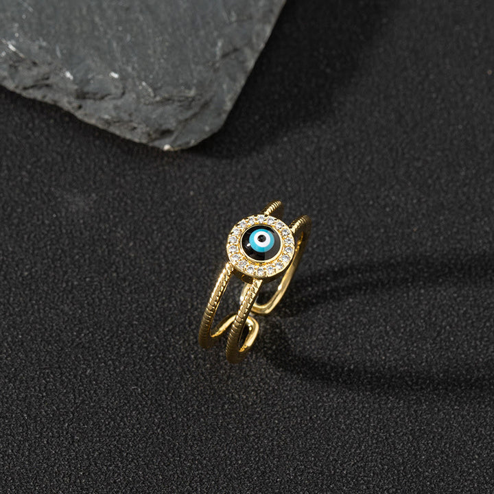 Bague ajustable Olivenorma en zircon blanc avec mauvais œil