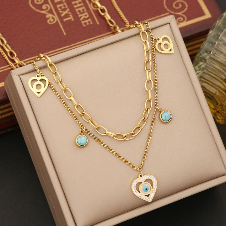 Collier et boucles d'oreilles Olivenorma en zircone turquoise avec mauvais œil 