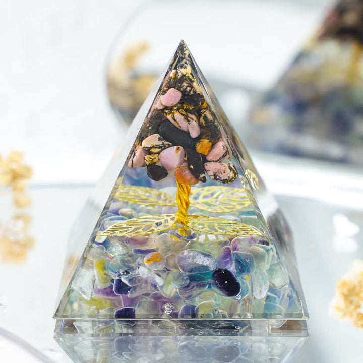 Pyramide d'orgone de croissance de rhodonite Olivenorma avec fluorite