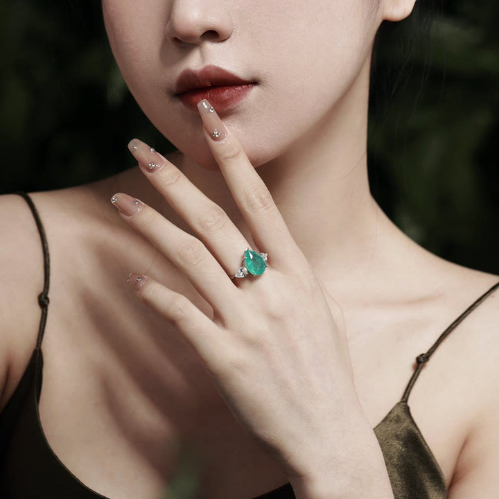 Bague exquise en zircon blanc et tourmaline Paraiba Olivenorma
