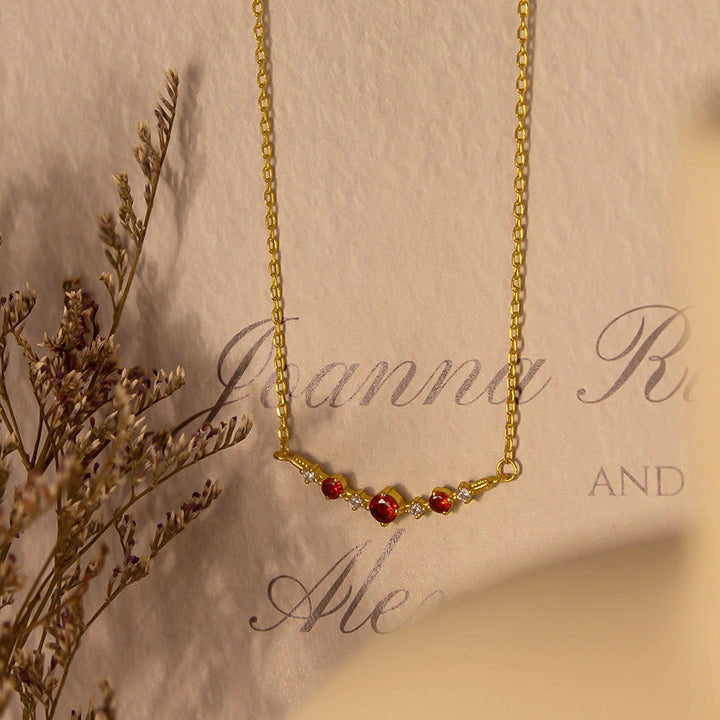 Collier Olivenorma « Symbole d'indépendance » avec diamants et grenats