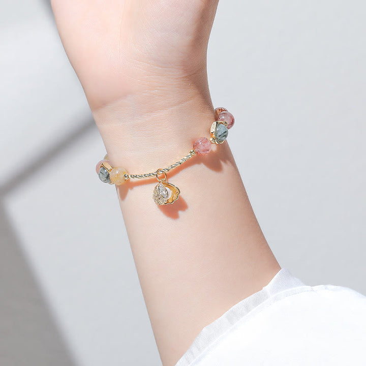 Bracelet pendentif coquillage en perles de quartz rutile couleur Olivenorma 