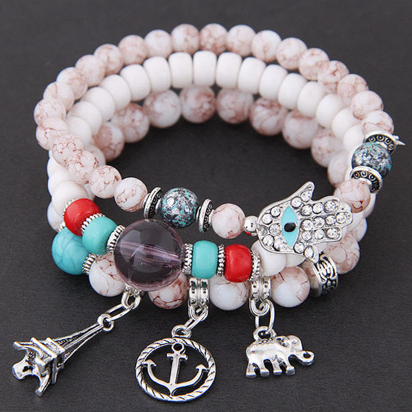 Ensemble de bracelets Hamsa contre le mauvais œil avec la tour de l'éléphant Olivenorma