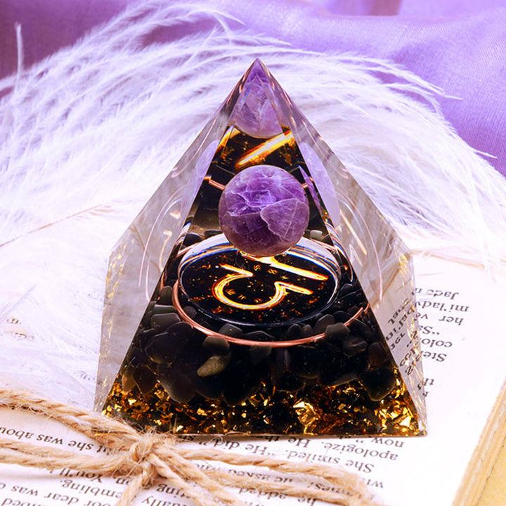 Sphère d'améthyste Olivenorma avec pyramide d'orgone du zodiaque Balance en obsidienne