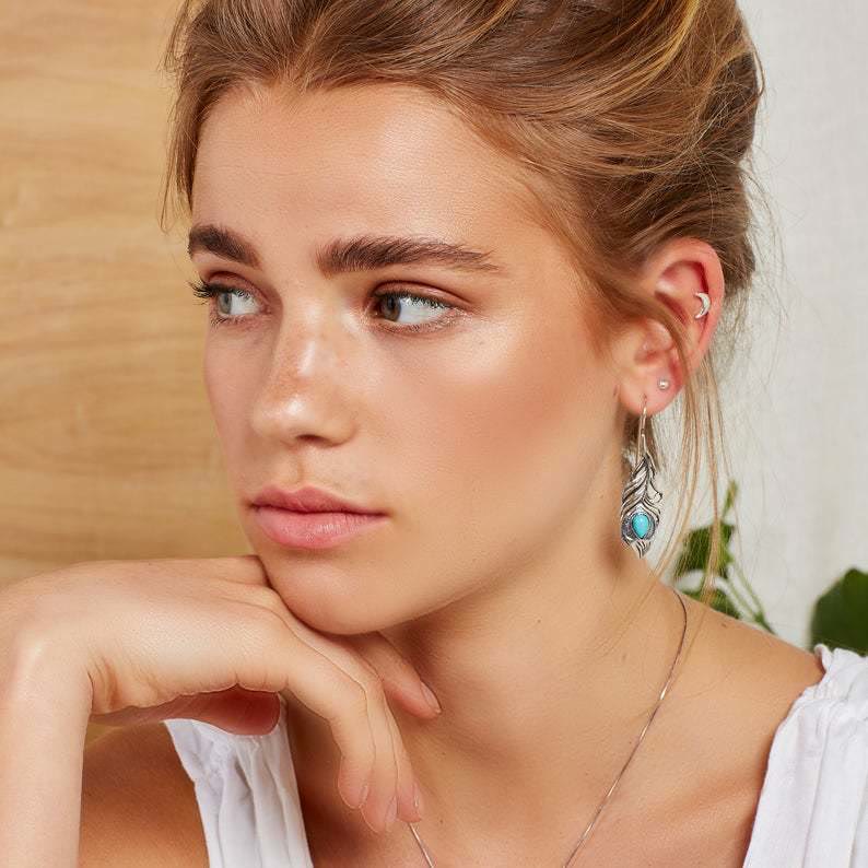 Boucles d'oreilles bohèmes découpées en plumes de paon turquoise vintage Olivenorma