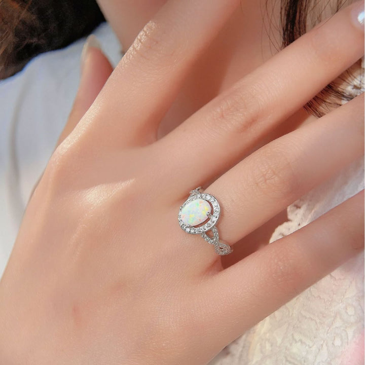 Bague tressée en zircon blanc et opale ovale Olivenorma