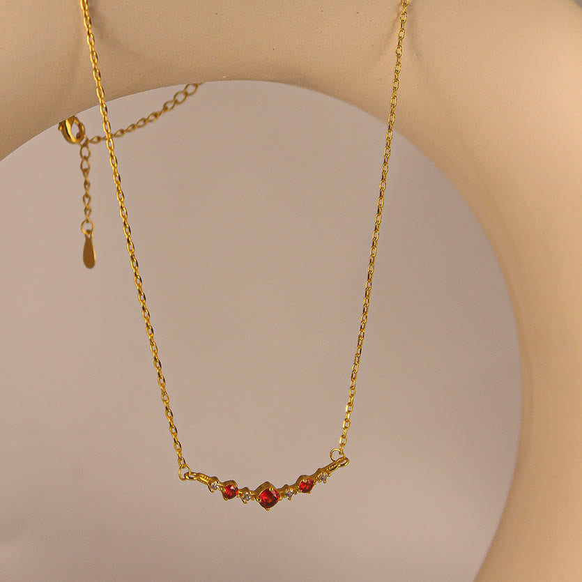 Collier Olivenorma « Symbole d'indépendance » avec diamants et grenats