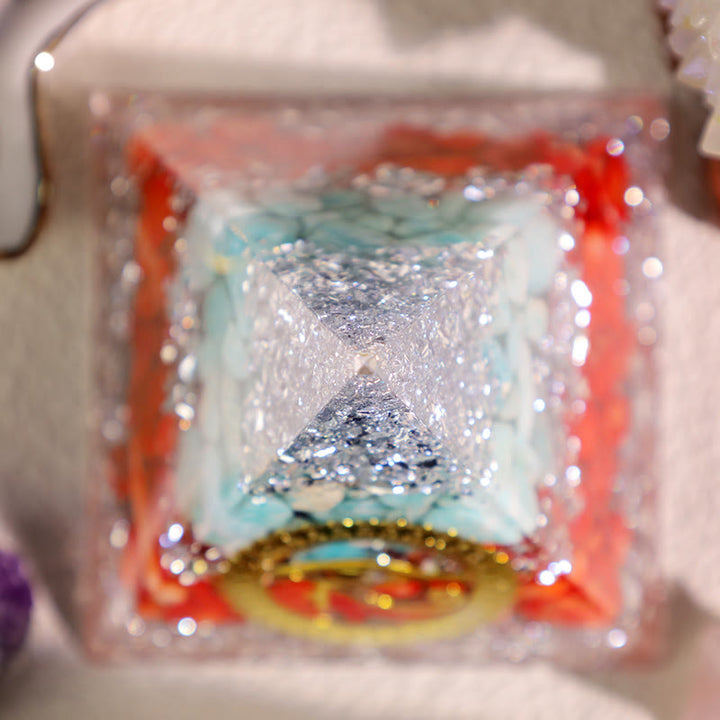 Pyramide d'orgone en corail rouge amazonite Olivenorma œil d'Horus