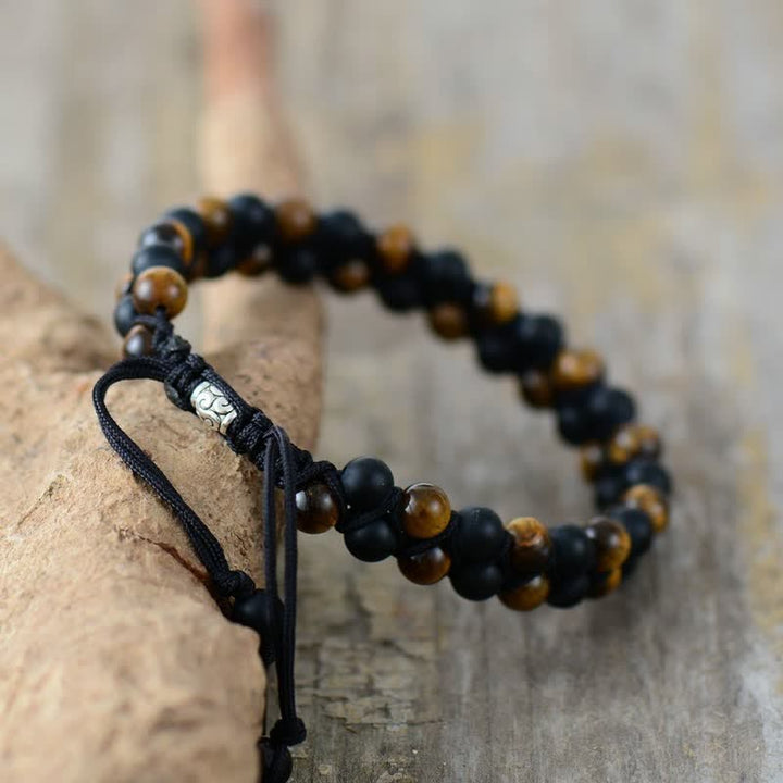 Bracelet tressé en perles d'onyx noir et œil de tigre Olivenorma 