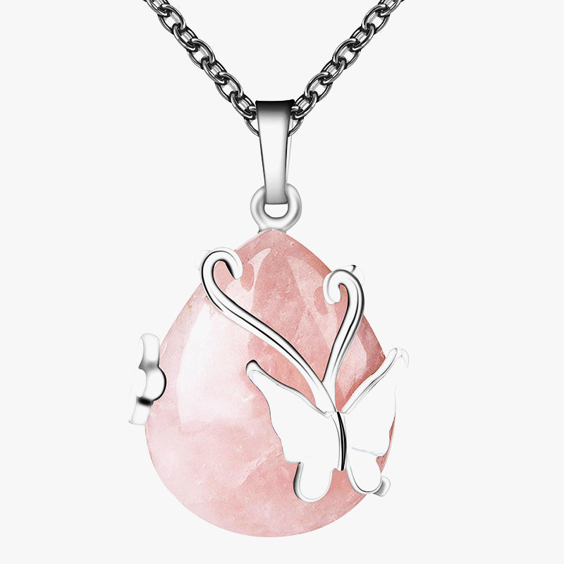 Collier en pierres précieuses avec ailes de papillon en cristal