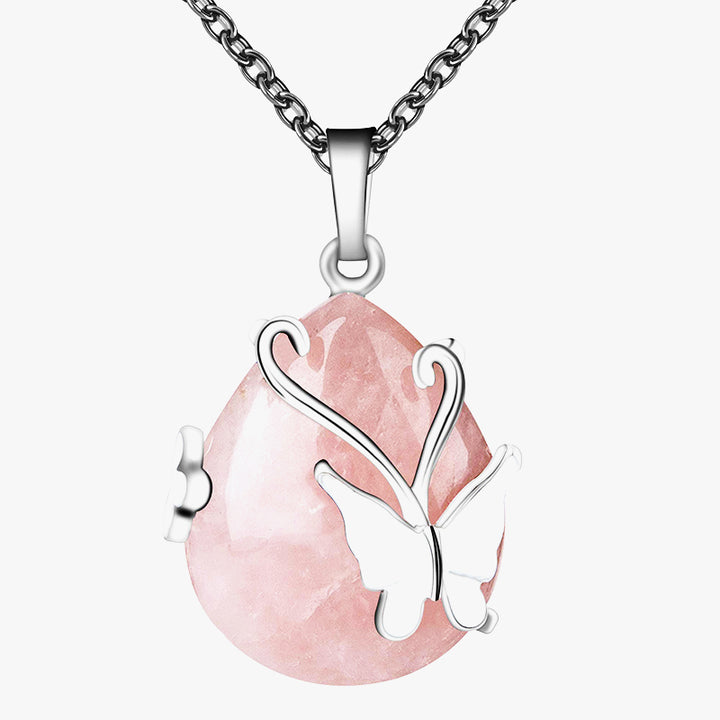 Collier en pierres précieuses avec ailes de papillon en cristal