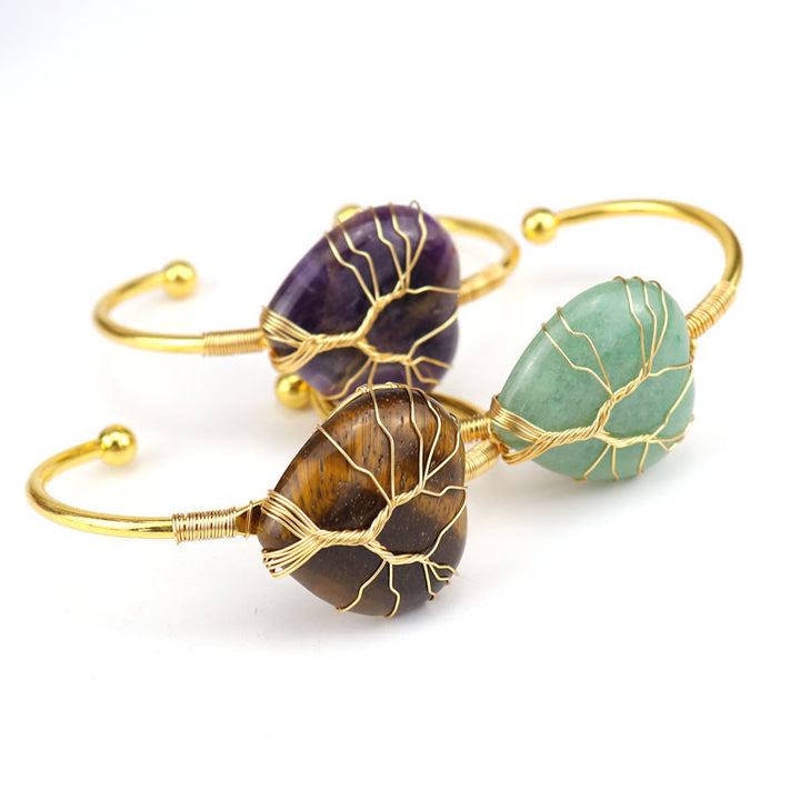 Bracelet en cristal naturel en forme de cœur enveloppé de fil de cuivre doré Olivenorma 