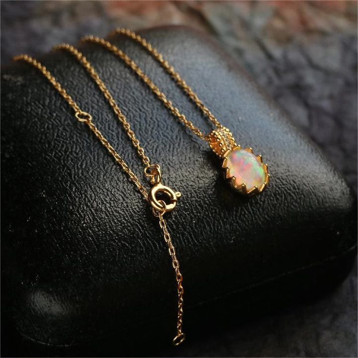 Collier avec anneau en or jaune opale Olivenorma 