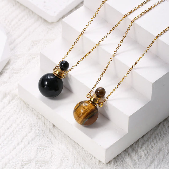 Collier pendentif bouteille de parfum en pierre ronde Olivenorma
