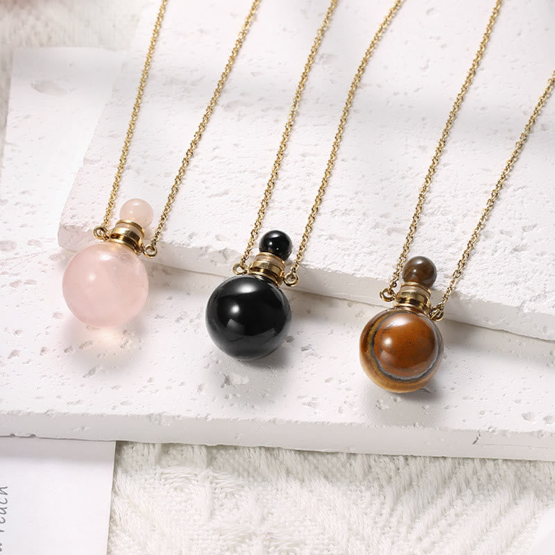 Collier pendentif bouteille de parfum en pierre ronde Olivenorma