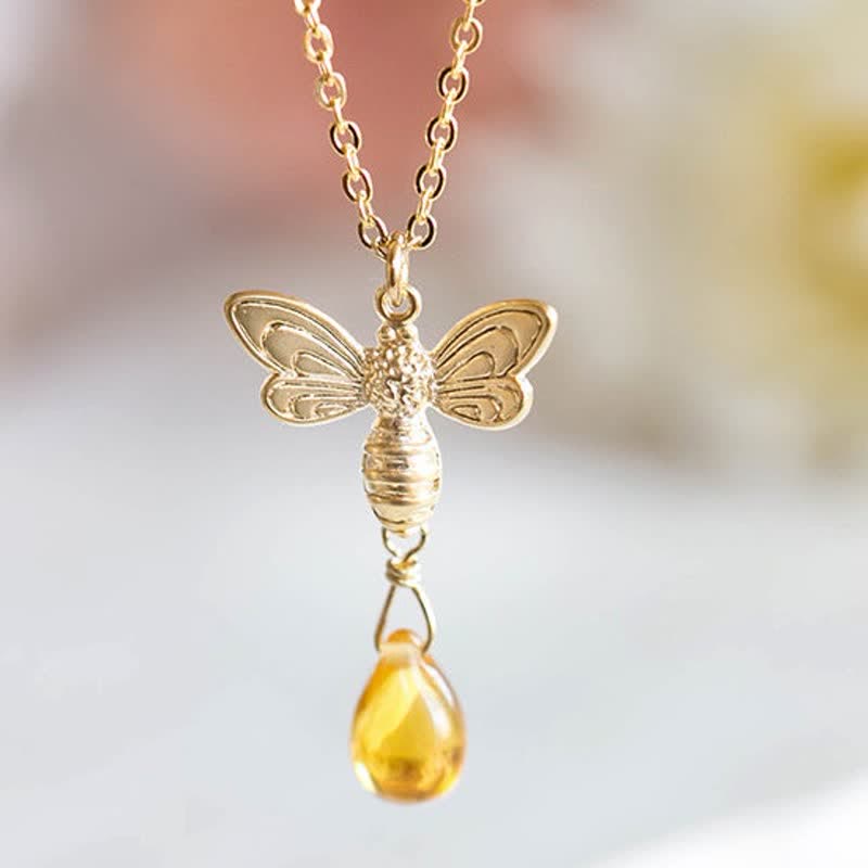 Boucles d'oreilles et collier en ambre avec pendentif en forme de goutte d'eau et de miel Olivenorma Bee Topaz