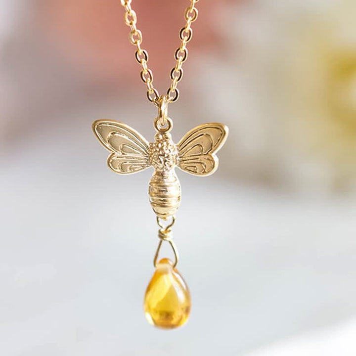 Boucles d'oreilles et collier en ambre avec pendentif en forme de goutte d'eau et de miel Olivenorma Bee Topaz