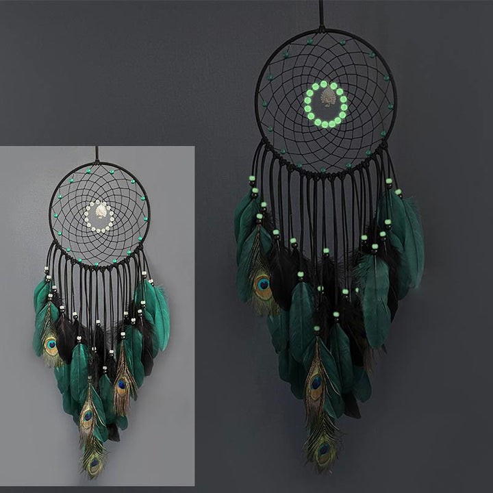 Attrape-rêves en plumes de paon fait main avec perles phosphorescentes Olivenorma