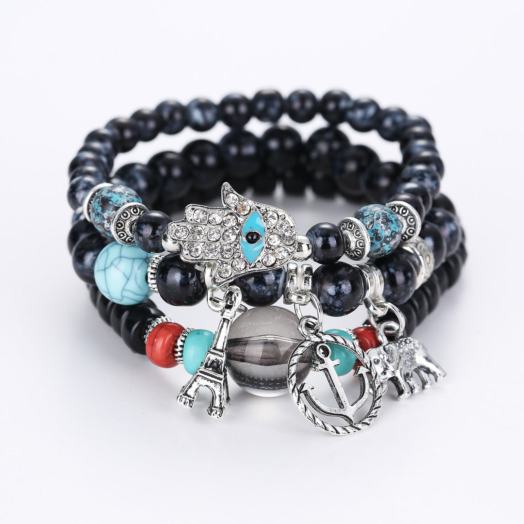 Ensemble de bracelets Hamsa contre le mauvais œil avec la tour de l'éléphant Olivenorma