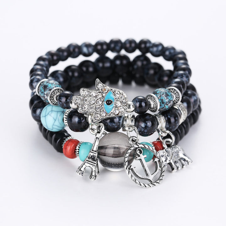 Ensemble de bracelets Hamsa contre le mauvais œil avec la tour de l'éléphant Olivenorma