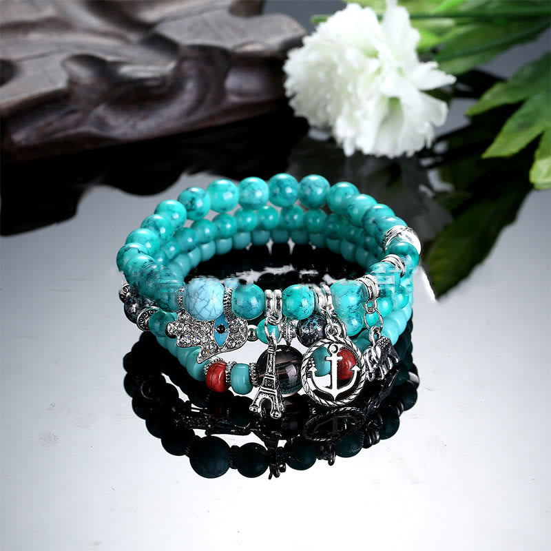 Ensemble de bracelets Hamsa contre le mauvais œil avec la tour de l'éléphant Olivenorma