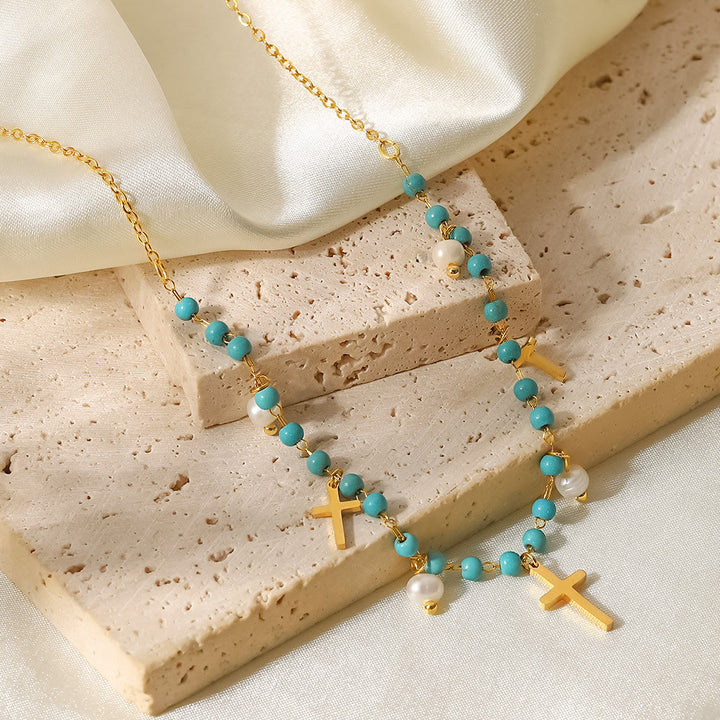 Collier à pampilles avec pendentif en croix et perles turquoise Olivenorma