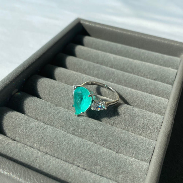 Bague exquise en zircon blanc et tourmaline Paraiba Olivenorma