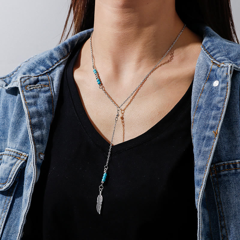 Collier bohème en argent et or avec pendentif en forme de feuille turquoise Olivenorma