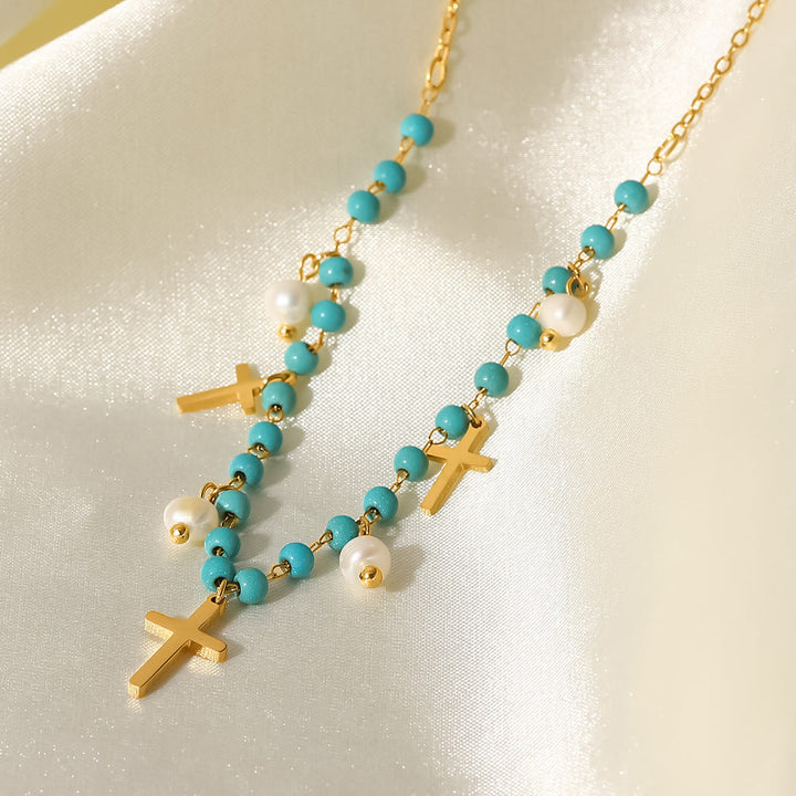 Collier à pampilles avec pendentif en croix et perles turquoise Olivenorma