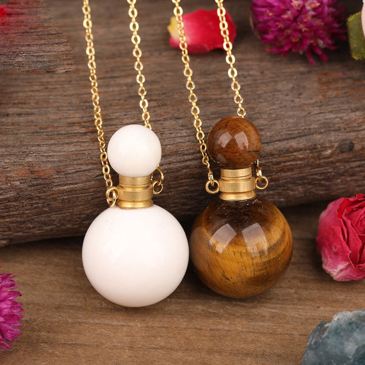 Collier pendentif bouteille de parfum en pierre ronde Olivenorma