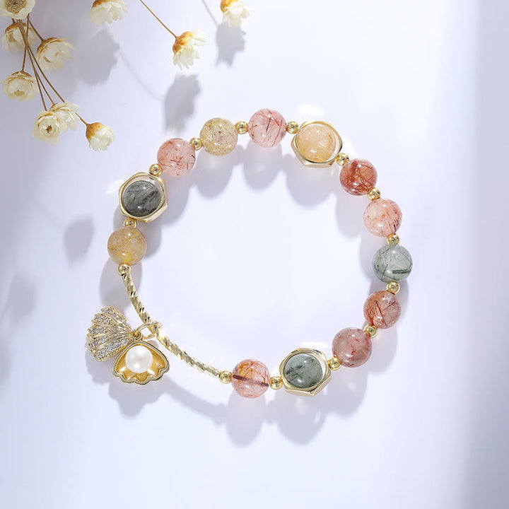 Bracelet pendentif coquillage en perles de quartz rutile couleur Olivenorma 