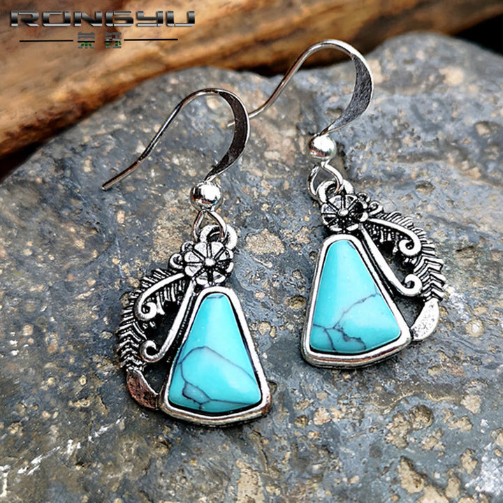 Boucles d'oreilles en plumes sculptées turquoise blanche Olivenorma - image 6