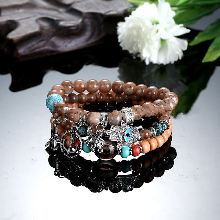 Ensemble de bracelets Hamsa contre le mauvais œil avec la tour de l'éléphant Olivenorma