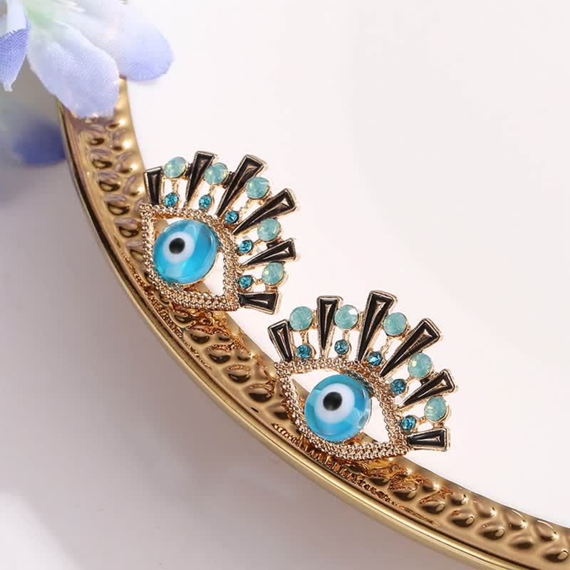 Olivenorma « Eye of Doom » - Boucles d'oreilles paon créatives en saphir