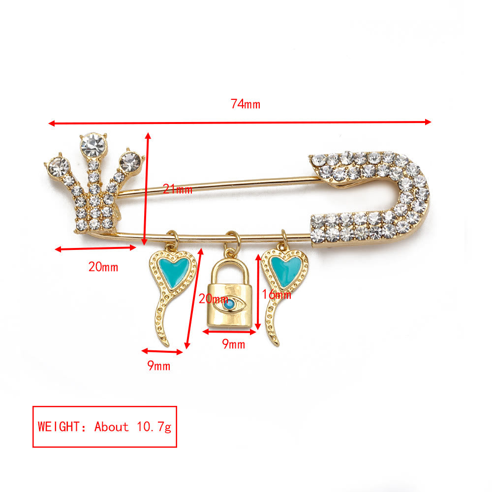 Broche en forme de cœur avec mauvais œil en zircon blanc Olivenorma 