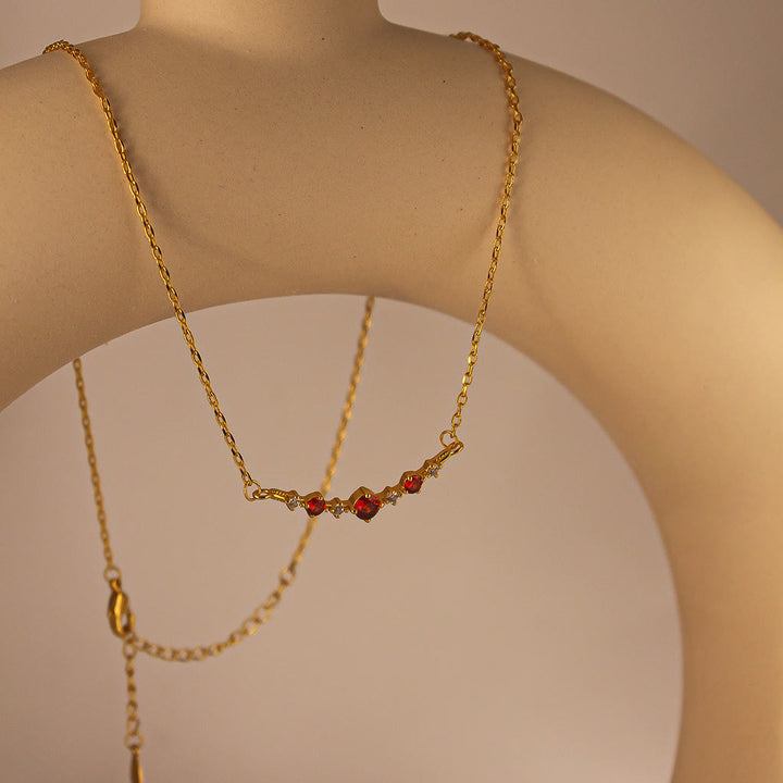 Collier Olivenorma « Symbole d'indépendance » avec diamants et grenats