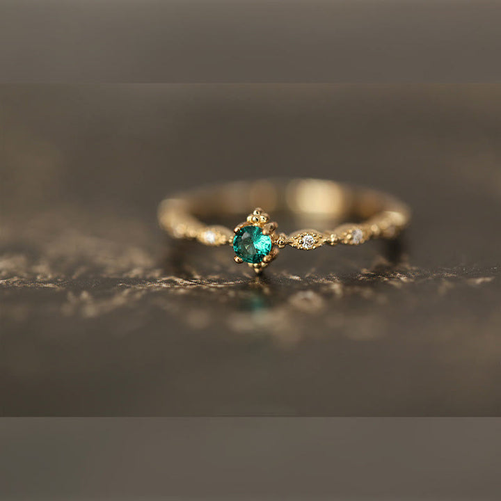 Bague Olivenorma en émeraude et zircone blanche