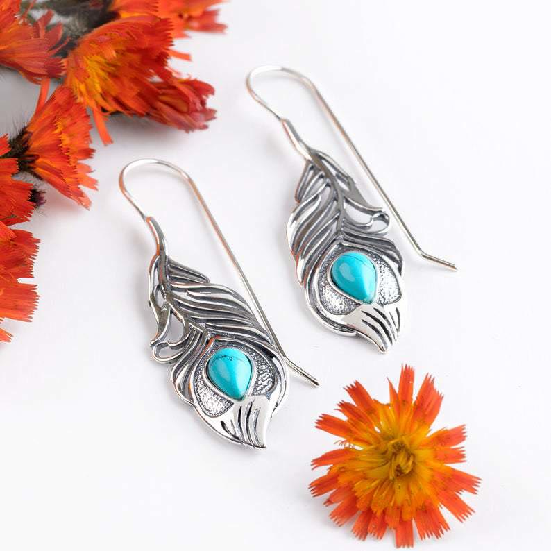 Boucles d'oreilles bohèmes découpées en plumes de paon turquoise vintage Olivenorma