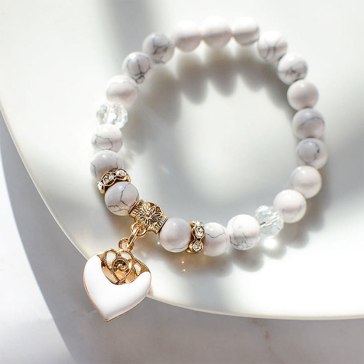 Bracelet en perles turquoise et rose blanche Olivenorma