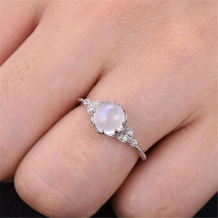 Olivenorma ronde en pierre de lune et opale blanche avec zircon